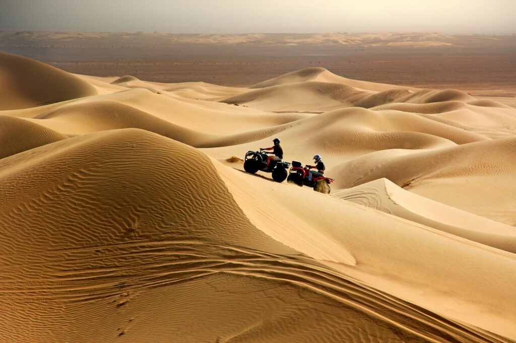 pexels-photo-11294565-11294565 Experience thrilling quad biking across Merzouga's stunning desert dunes.